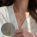 Layered Pearl and Gold Irregular Oval Pendant Necklace for Women Fashion Elegant Clavicle Chain - Double Layer Layered Artificial Pearl Oval Necklace (XL0847-2)