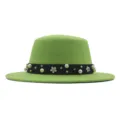 Close-up view of the green flat top fedora hat detail, featuring pearl and flower band decoration. - 57cm / Green