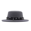 Close-up detail of the grey felt hat featuring a black band with pearl and metal floral studs. - 57cm / Light Gray