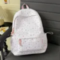 Floral fabric backpack for women, sweet style school bag with front pocket and side slots - Pink