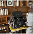 Black vintage leather backpack for women, retro daily school book bag with cute dog charm. - Black + Chocolate Puppy
