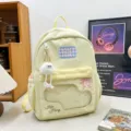 Milk yellow canvas backpack for students, cute casual daily commuting lightweight school bag. - Long Legged White Fur Ball / Yellow