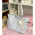 Casual light blue tote bag for women, featuring cute star and moon prints with a star pendant. - With Charm / Blue