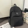 Minimalist black nylon backpack for women, stylish school bag for daily use. - Without Pendant / Black
