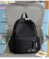 Black casual backpack for students, stylish daily daypack with cute embroidery and durable design. - S / No Pendant / Black White Pattern