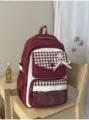 Burgundy plaid student backpack with clear window pocket and bow, ideal for school daily use. - Red