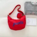 Red nylon crossbody shoulder bag for women, vibrant contrast letter design with cute mini pouch. - Red