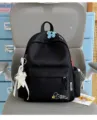 Casual black school backpack with embroidery flower patch and star charm for daily student use. - S / Polka Dot Bow Star / Black With Blue Flowers