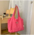 Felle roze tote bag met schattige hondenborduurwerk, minimalistische casual stijl voor dagelijks. - Roze