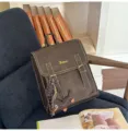 Vintage brown backpack for women casual daily use large capacity stylish school bookbag. - Chocolate Puppy Pendant Style / Coffee