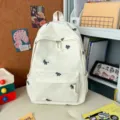 Minimalist cute embroidered canvas school backpack for students, stylish and lightweight daily bag. - Single Bag (Without Charms) / White