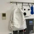 Zaino casual bianco con stampa di stelle, zainetto da viaggio leggero con tasca e ciondolo. - Bianco + Pentagramma a Pois