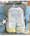 Pastel blue Japanese style school backpack with cute plaid window and star charms. - Pink Bow Polka Dot Pentagram + Pentagram Cat Badge / Blue