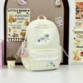 Off-white canvas school backpack with cute lace trim, bow, and snowflake graphic for daily use. - White with Pendant