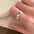 Exquisite silver clover ring with blue stones, minimalist open design for daily wear. - Adjustable / JZ5494