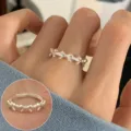 Silver bowknot open ring for women, dainty ribbon finger jewelry, minimalist everyday wear. - Continuous Bow Band (JZ7461)