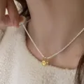 Silver chain necklace with gold smiley face and heart pendant, stylish minimalist clavicle design. - Smiley Face Heart Pendant Chain (XL1483)