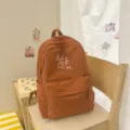Warm tone grid student backpack with bubble texture, lightweight daily school bag for girls. - L / Orange