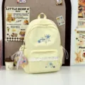 Casual canvas school backpack in light yellow with cute lace trim and snowflake embroidery. - Yellow with Pendant