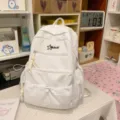 Stylish white student backpack with large capacity and trendy embossed design for daily use. - Bag Only (No Charm) / L / White