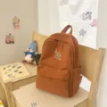 Brown grid student backpack with bubble texture, lightweight casual daypack for school or daily use. - S / Orange