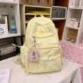 Cute yellow textured school backpack for girls, stylish daily casual bookbag with large capacity - With Charm / L / Yellow