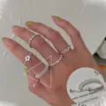 Silver multi-layer chain ring set featuring delicate flower and bead details for women. - JZ9577