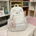 Stylish white backpack for teenage girls, large capacity ins style school bag with cute pendant. - With Charm / S / White