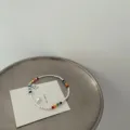 Minimalist silver rainbow beaded bracelet with cute bear and heart pendant for women. - Colorful Beaded Bracelet