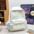 Aesthetic pastel star print school backpack with cute plush pendant for student daily commute. - White + Blue Star with Ball