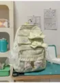 Light green plaid school backpack with cute bows and plush toys, sweet student casual bag - Gluttonous Bear + Carrot Rabbit Pendant / Green