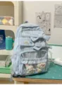 Light blue plaid student backpack with cute bows and plush toys, sweet daily casual daypack - Gluttonous Bear + Carrot Rabbit Pendant / Blue