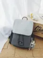 Casual gray and white contrast double shoulder backpack with cute bear pendant for daily use. - Crooked Neck Bear Pendant / Army Green