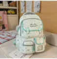 Mint green star print student casual backpack, lightweight travel daypack in cute aesthetic design. - No Pendant / Green