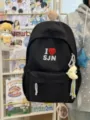 Black canvas student schoolbag with embroidered love heart design, casual daily backpack. - Moon Charm / Black