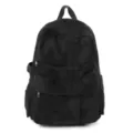 Black casual multi-pocket backpack with soft texture, ideal for daily commute and travel. - Black