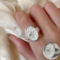 Silver floral oval ring with sparkling center stone elegant adjustable jewelry for women main view - Adjustable / JZ5035