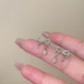 Orecchini clip fiocco in cristallo argentato, elegante design zircone per donne e ragazze. - Orecchini Pendenti a Fiocco in Strass Argentati (ED1896)