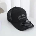 Detail view of black mesh sun hat featuring a built-in rechargeable mini fan and display. - Solar Power and Rechargeable Model 600MA / Black