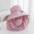 Detail view of the pink floral sun hat featuring a built-in solar rechargeable fan. - Watermelon red