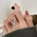 Anillo Corazon Hueco Plata Abierto Ajustable Moda Minimalista Joya Dedo Variante - Abierto Ajustable / Estilo Simple de Corazón Calado (JZ6152)