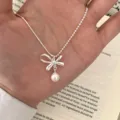 Sweet bow imitation pearl necklace for women, elegant silver clavicle chain fashion jewelry. - XL2052