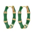 Close-up detail of green enamel bamboo hoop earrings, elegant gold-plated metal jewelry design. - Green