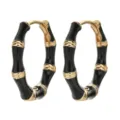 Exquisite black enamel bamboo hoop earrings with gold-tone accents for elegant daily wear. - Black