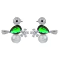 Detailed shot of elegant bird earrings featuring green teardrop zircon, pearl and sparkling cz. - Green
