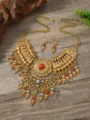 Boho ethnic style vintage alloy statement necklace and earrings set with red and blue stones. - Antique Gold Multi-colored
