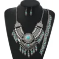 Detail view of vintage ethnic style turquoise necklace and earring set, bohemian jewelry. - Antique Silver Blue