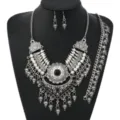 Detailed close-up of the vintage silver-toned ethnic bohemian style statement jewelry set. - Antique Silver Black