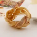 Bold metal spring woven bracelet, heavy metal style fashion statement jewelry for women. - Gold