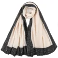 Detailed view of women pleated crinkle hijab scarf with black speckled print border soft breathable - Beige